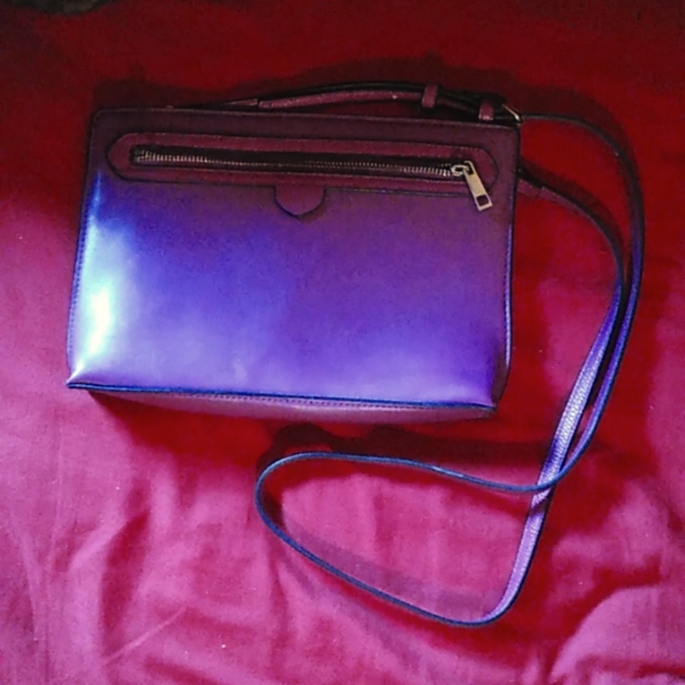 Purple. A New Day . Purse. A little bigger than a clutch